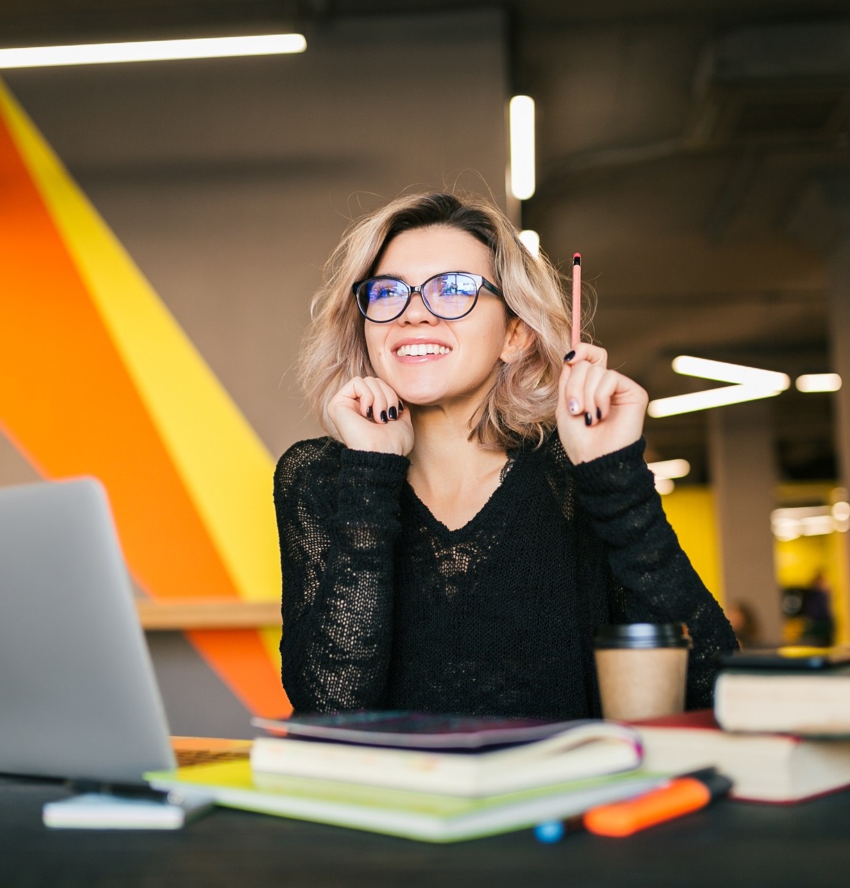 34601225128045-portrait-young-pretty-woman-sitting-table-black-shirt-working-laptop-co-working-.jpg