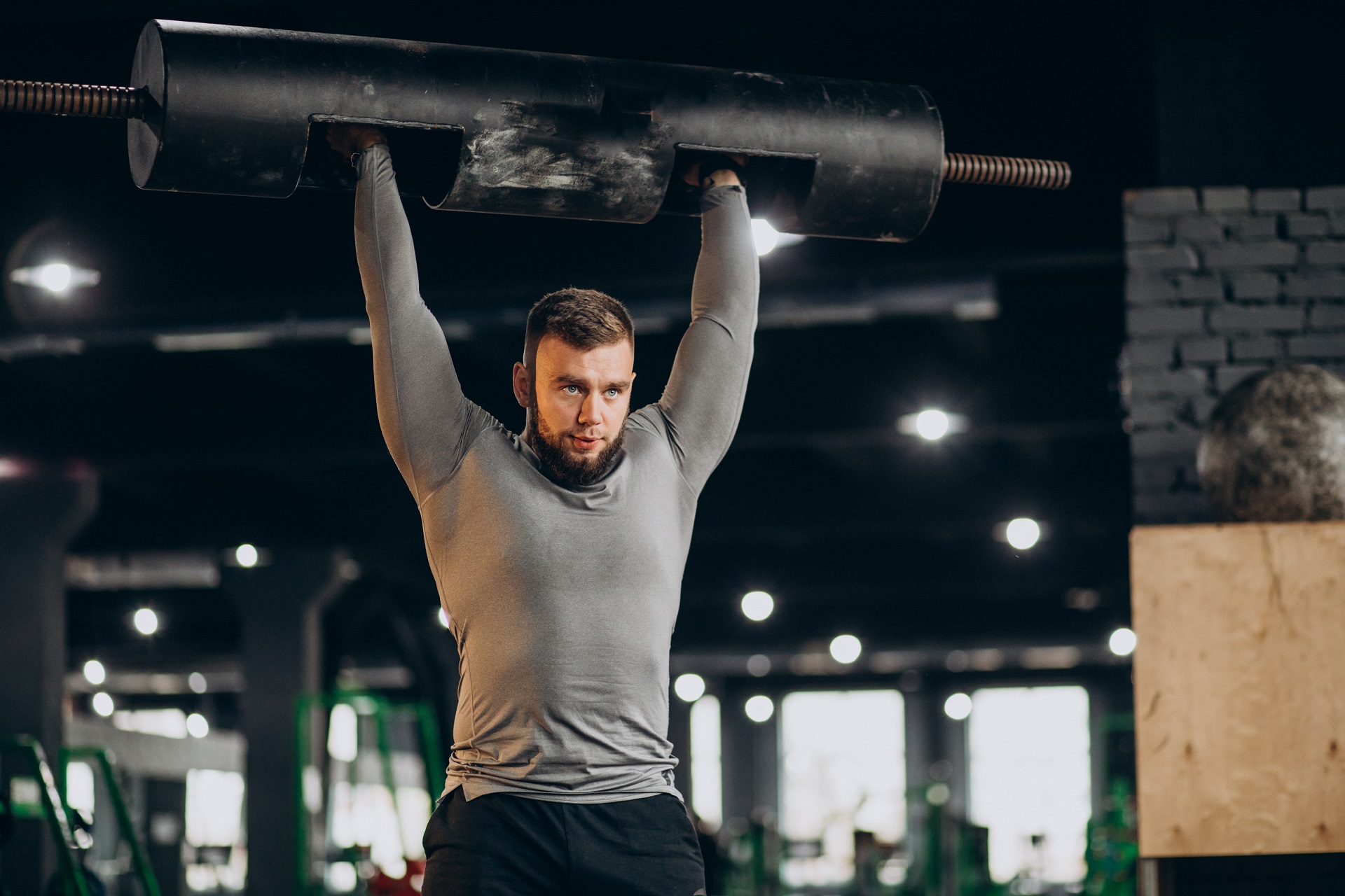 76-2handsome-man-exercising-gym.jpg