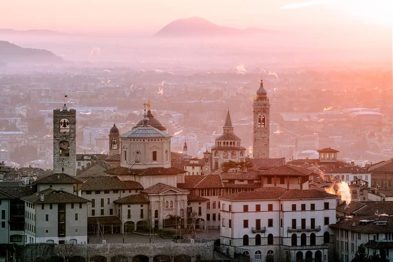 r70-bergamo-in-the-morning-high-angle-view-of-buildings-royalty-free-image-167045022-16746454199705.jpg