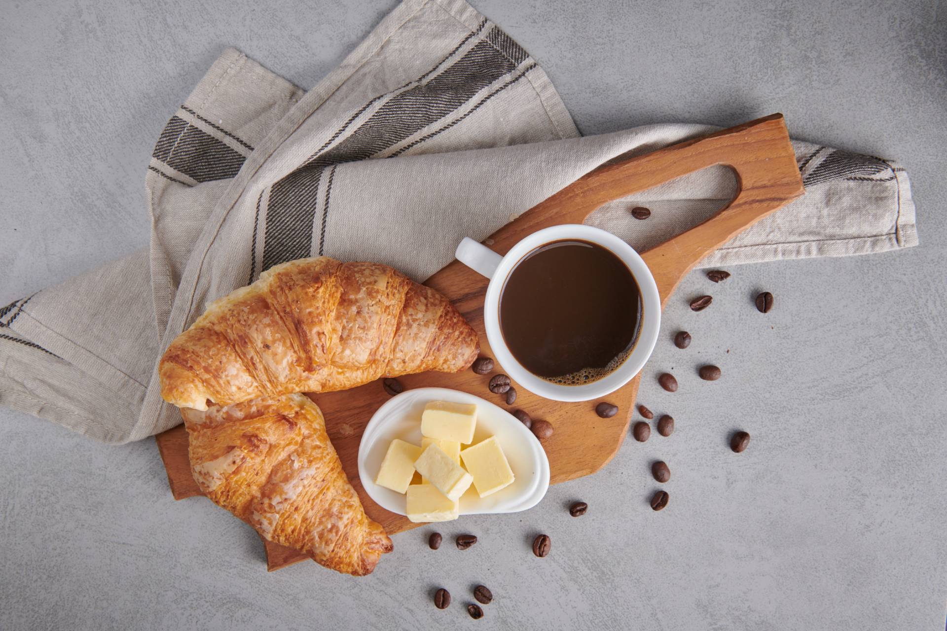 r15-delicious-breakfast-with-fresh-croissants-coffee-served-with-butter.jpg