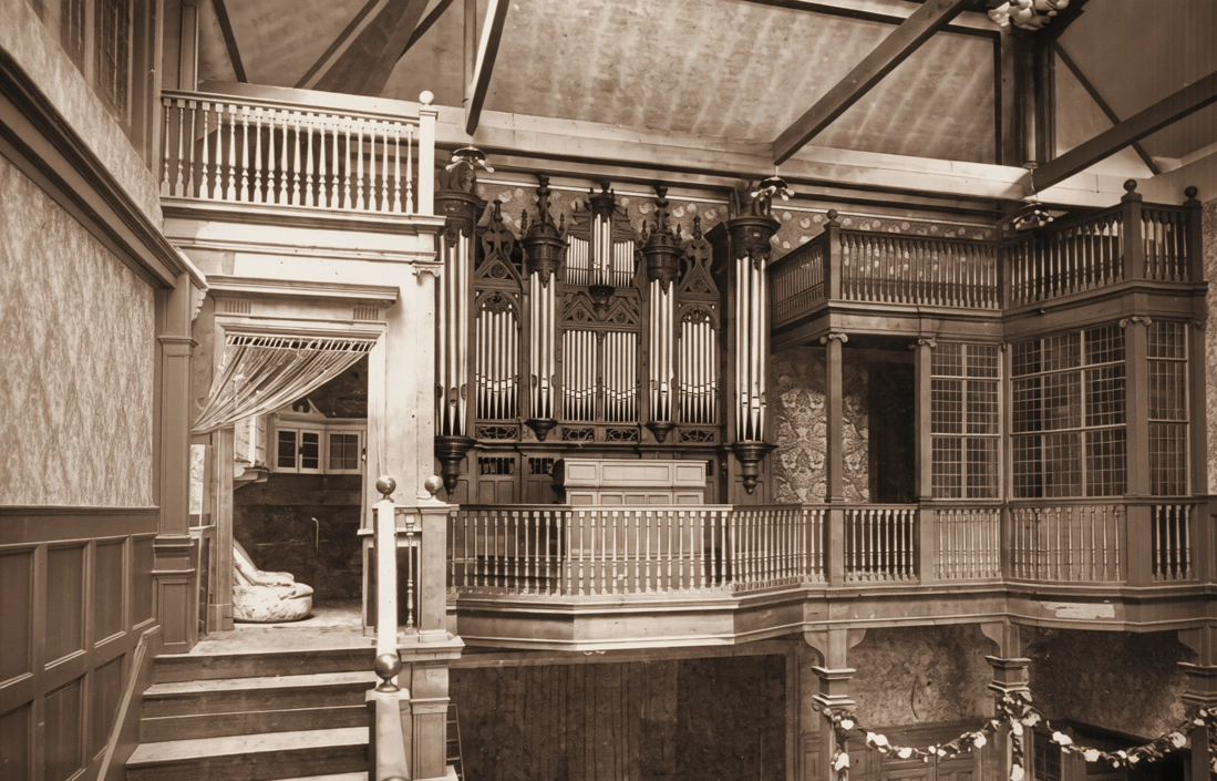 The music studio of Winnaretta Singer's first Paris hôtel, fitted with a large pipe organ — almost certainly built by Aristide Cavaillé-Coll, the master organ-builder of Notre-Dame and Saint-Sulpice. Winnaretta was herself an accomplished organist, trained from childhood; her preferred instruments were never the salon piano or the harp but the organ and the harpsichord. From this room, between 1887 and the turn of the century, she launched the patronage that would define her life.