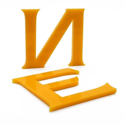 Лазерно рязане на обемни букви от жълт плексиглас