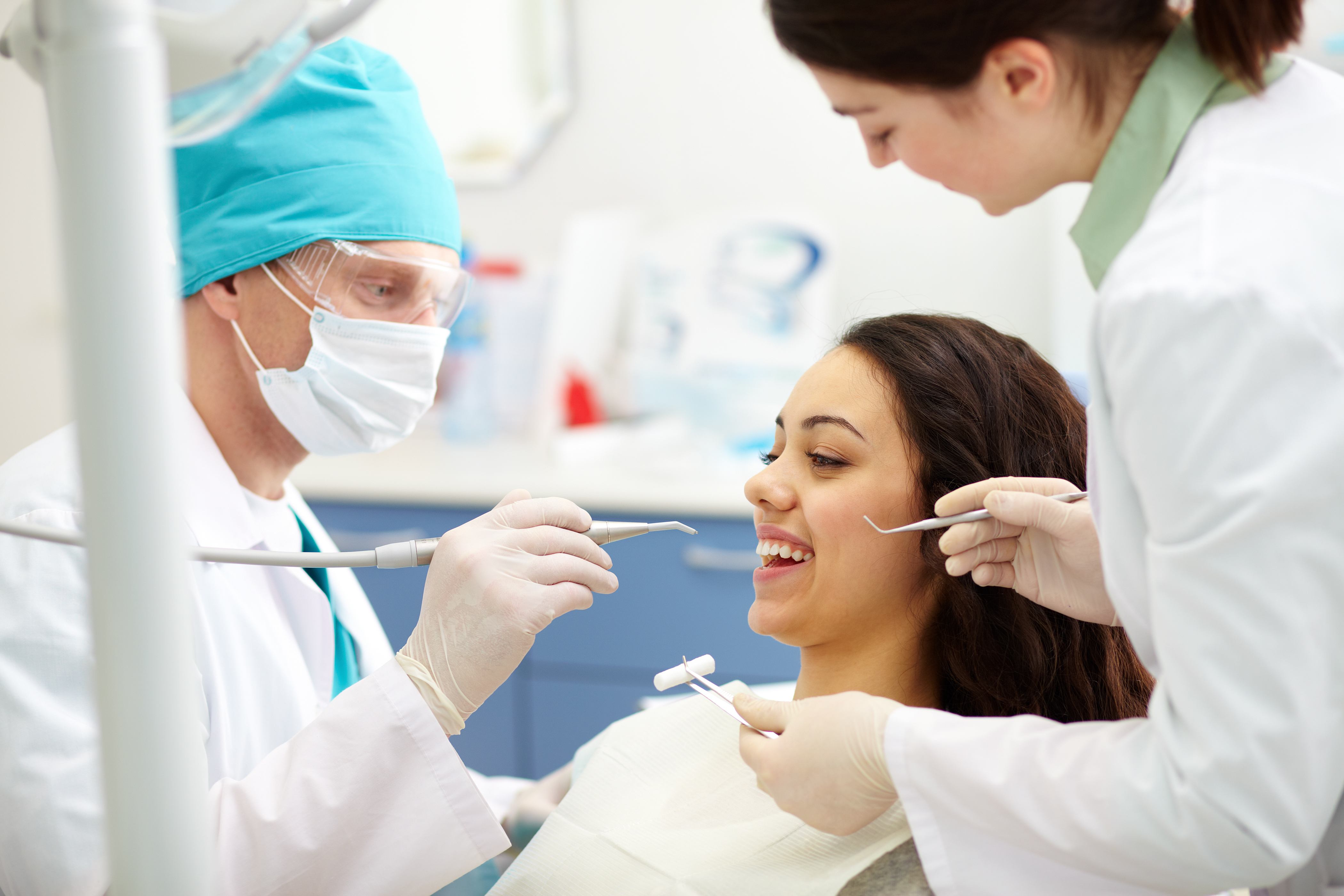 169-dentist-examining-patient-s-teeth.jpg