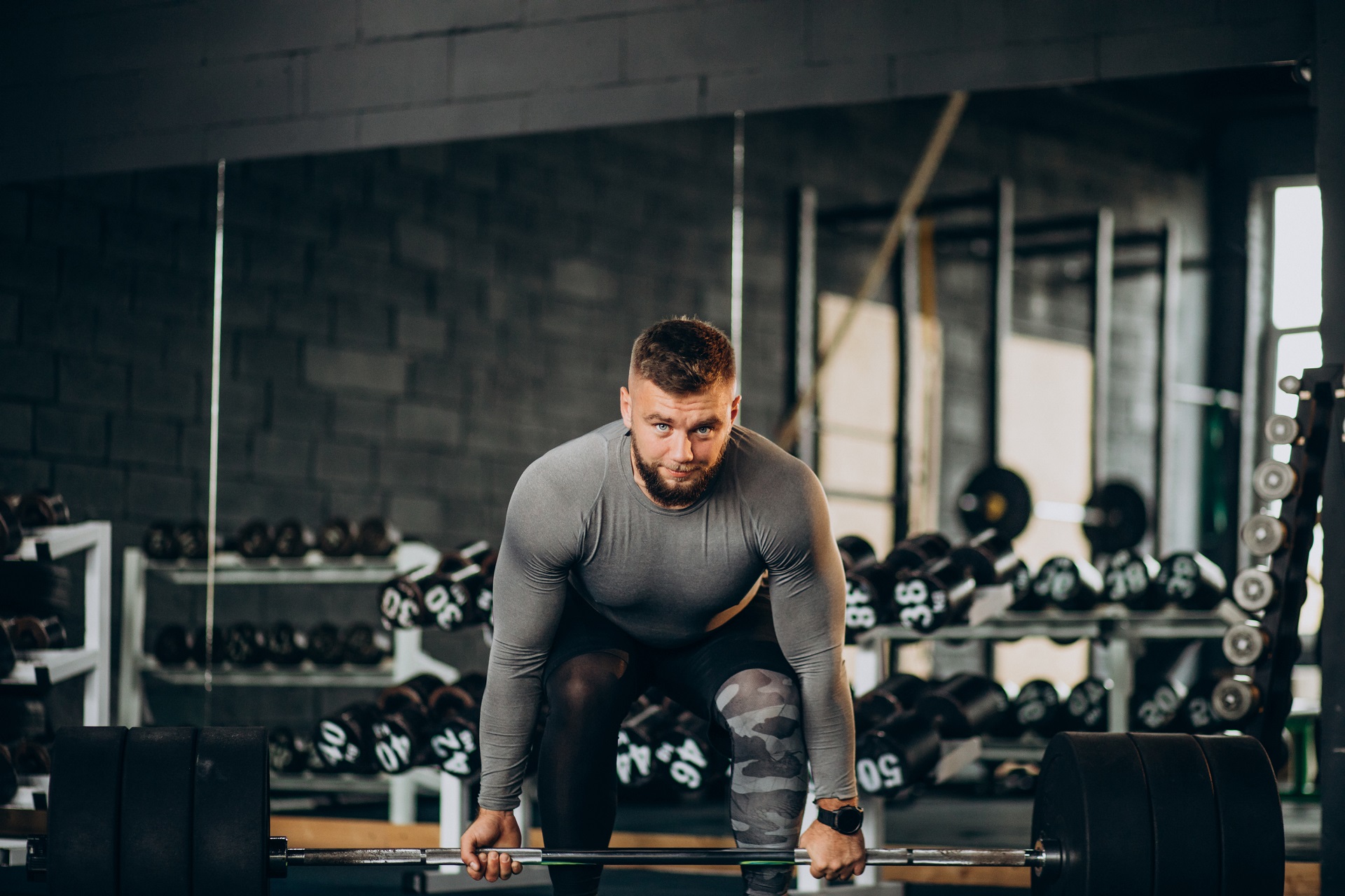 610-1strong-man-exercising-gym.jpg