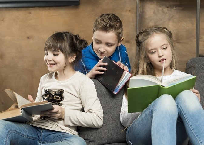 3112673480572-three-children-reading-17299520150863.jpg