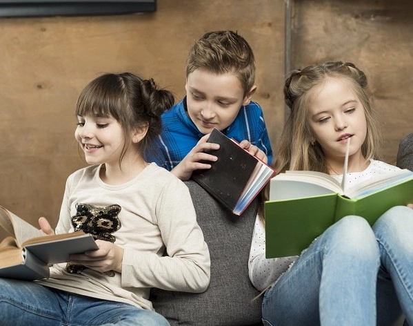 6712599472572-three-children-reading-17299520150863.jpg