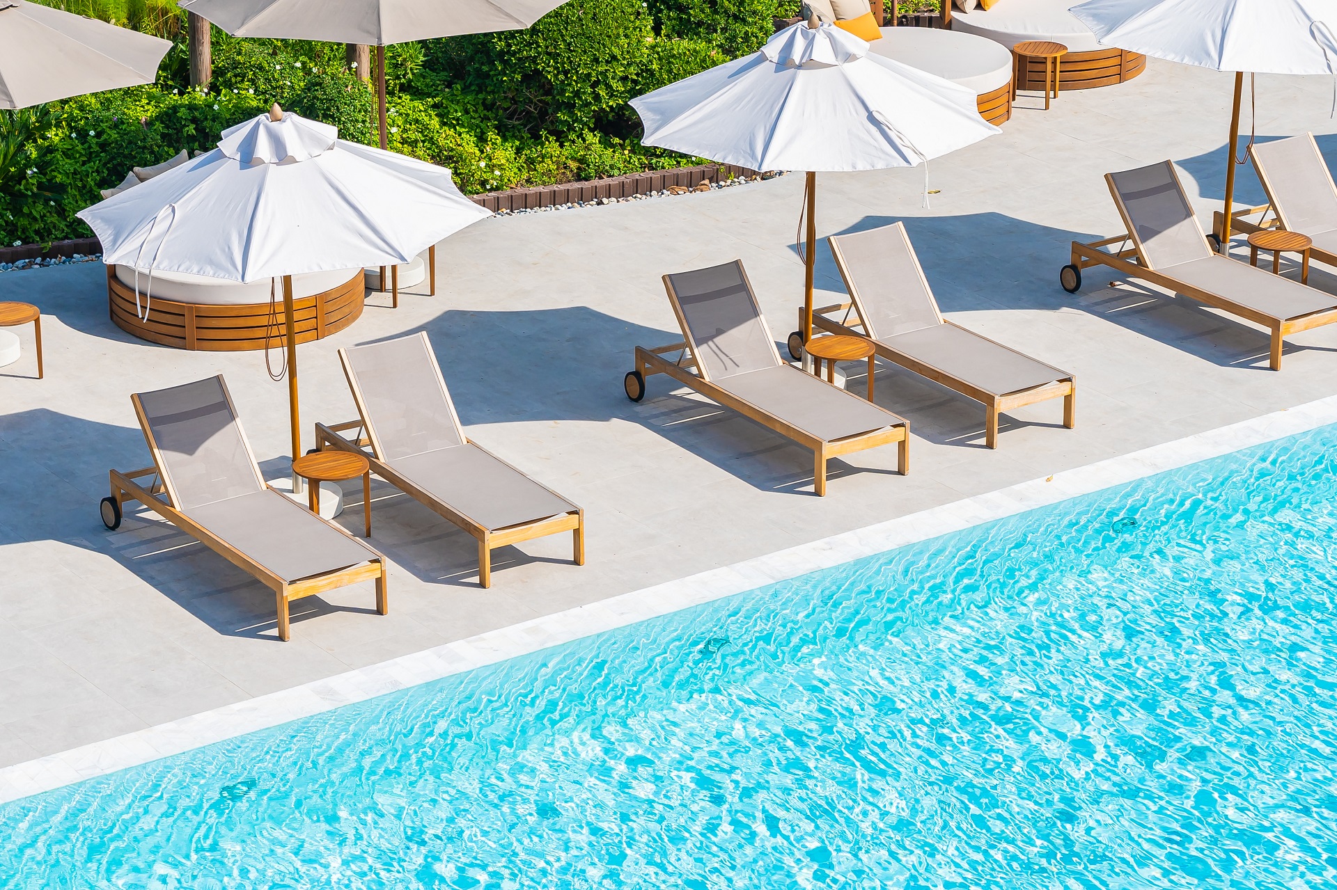 r17-umbrella-deck-chair-around-outdoor-swimming-pool-hotel-resort-nearly-sea-beach-o-16535703745386.jpg