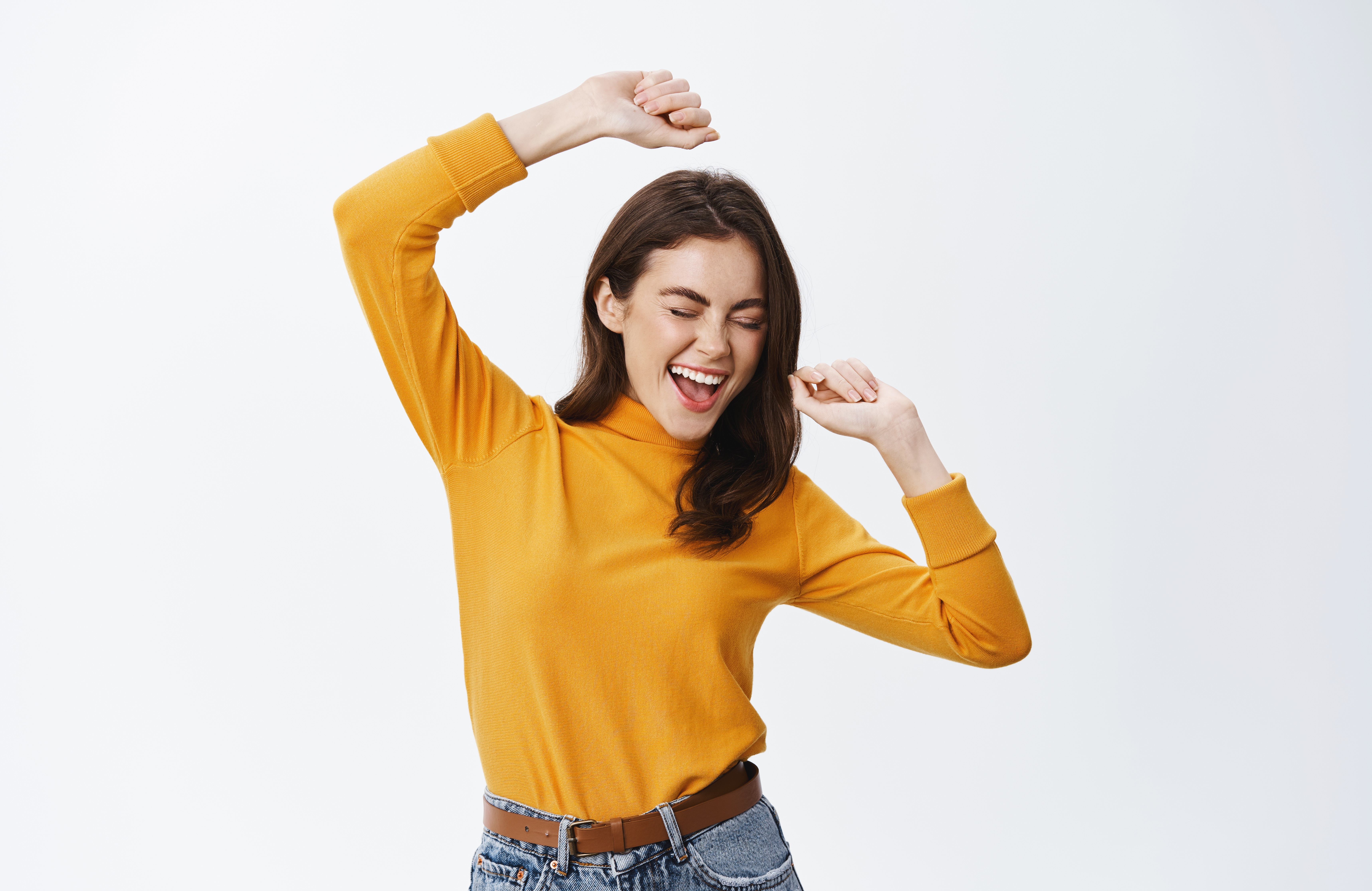 1121-happy-attractive-woman-dancing-having-fun-raising-hands-up-carefree-enjoying-mus.jpg