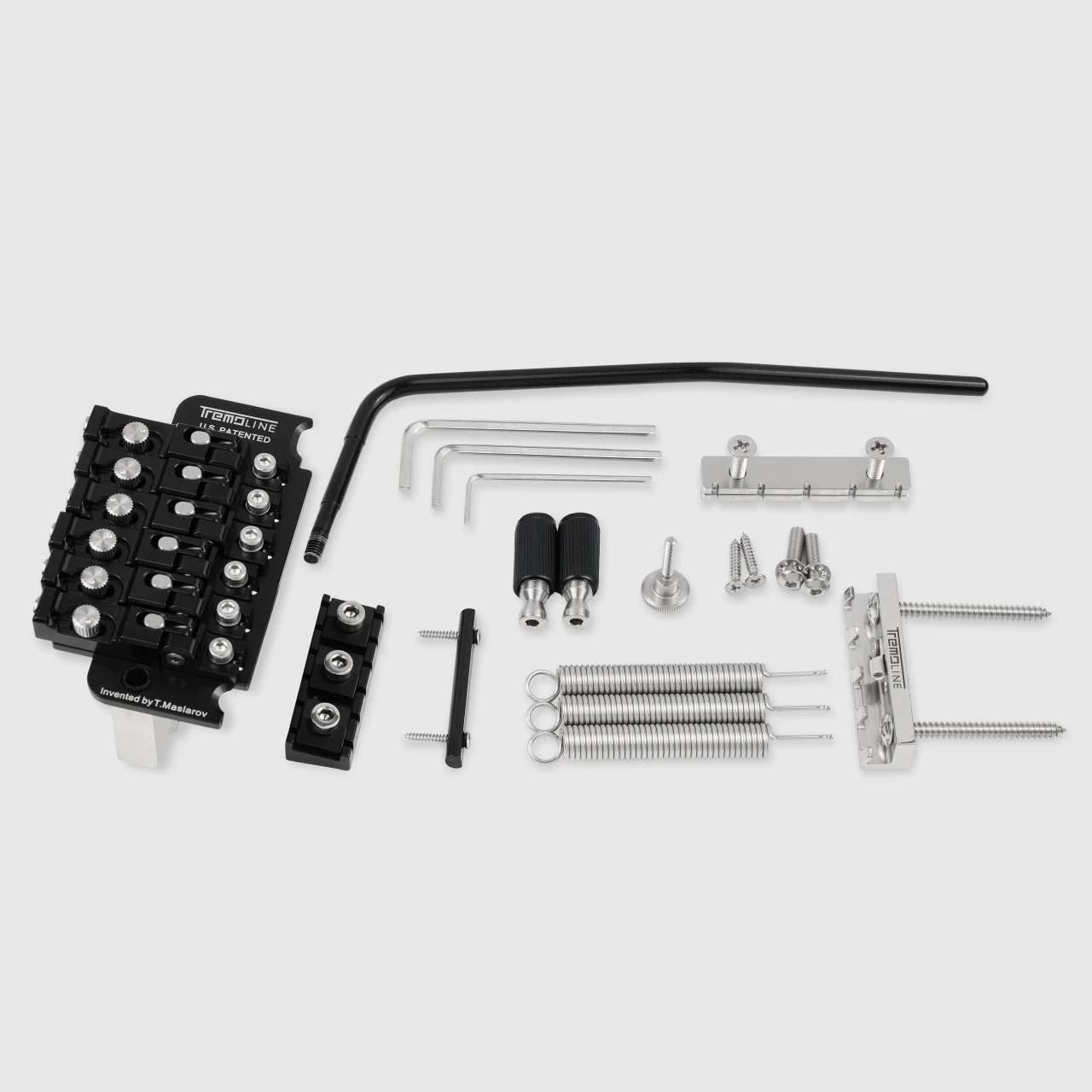 <img src=”Tremoline-Tremolo-system-flat-top-FT36T-R3-BS_3” width="1280" height="1280" alt=”All parts of the Tremoline FT36M double locking tremolo set” />