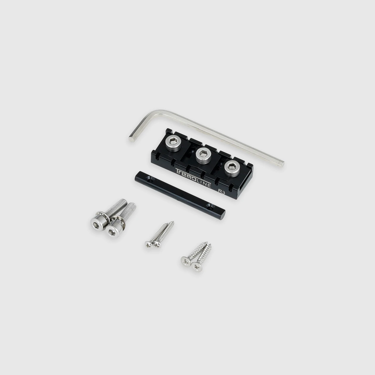 <img src=”Tremoline-Tremolo-system-flat-top-FT36T-R3-BS_6” width="1280" height="1280" alt=”locking nut set of the Tremoline FT36T tremolo from the rear side” />