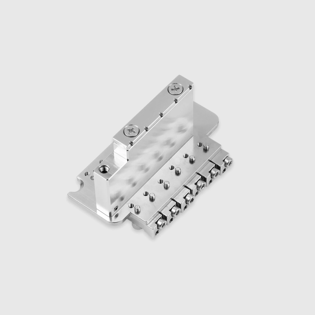 <img src=”Tremoline-Tremolo-system-flat-top-FT36T-R3-SP_5” width="1280" height="1280" alt=”tremolo unit of the Tremoline FT36T double locking tremolo from below” />