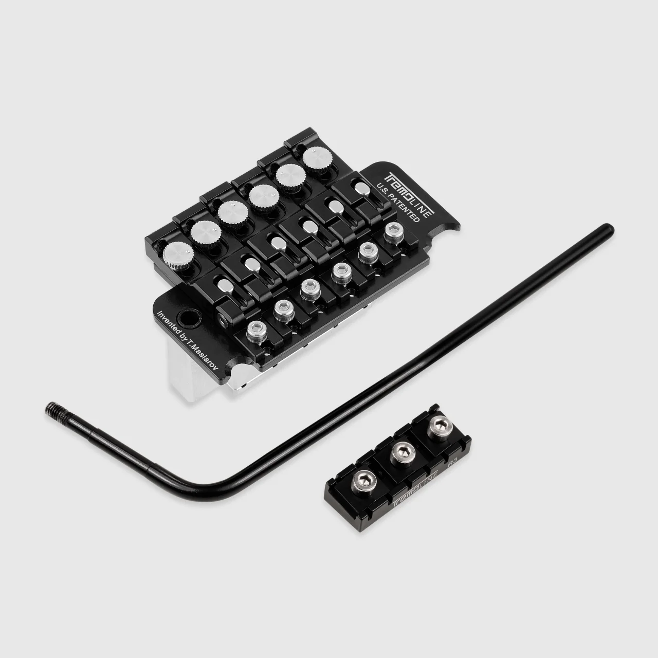 <img src=”Tremoline-Tremolo-system-FT36T-R3-BS-1280x1280-t01b” width="1280" height="1280" alt=”black stainless steel tremolo parts” />