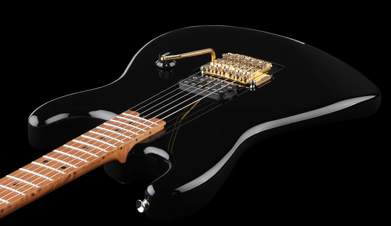 <img src=”Tremoline-FT36T-guitar-locking-tremolo-1280x741-S05A” width="1280" height="741" alt=”Tremoline FT36T locking tremolo on Harley Benton RH guitar” />