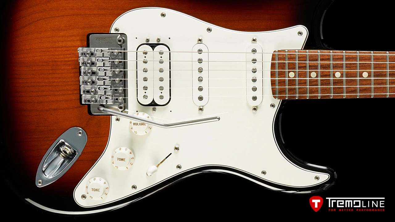 <img src=”Tremoline-guitar-double-locking-tremolo-Fender-Stratocaster-RH-1280x720-J1A.jpg” width="1280" height="720" alt=”Tremoline FT36M double locking tremolo on Fender Stratocaster RH guitar” />