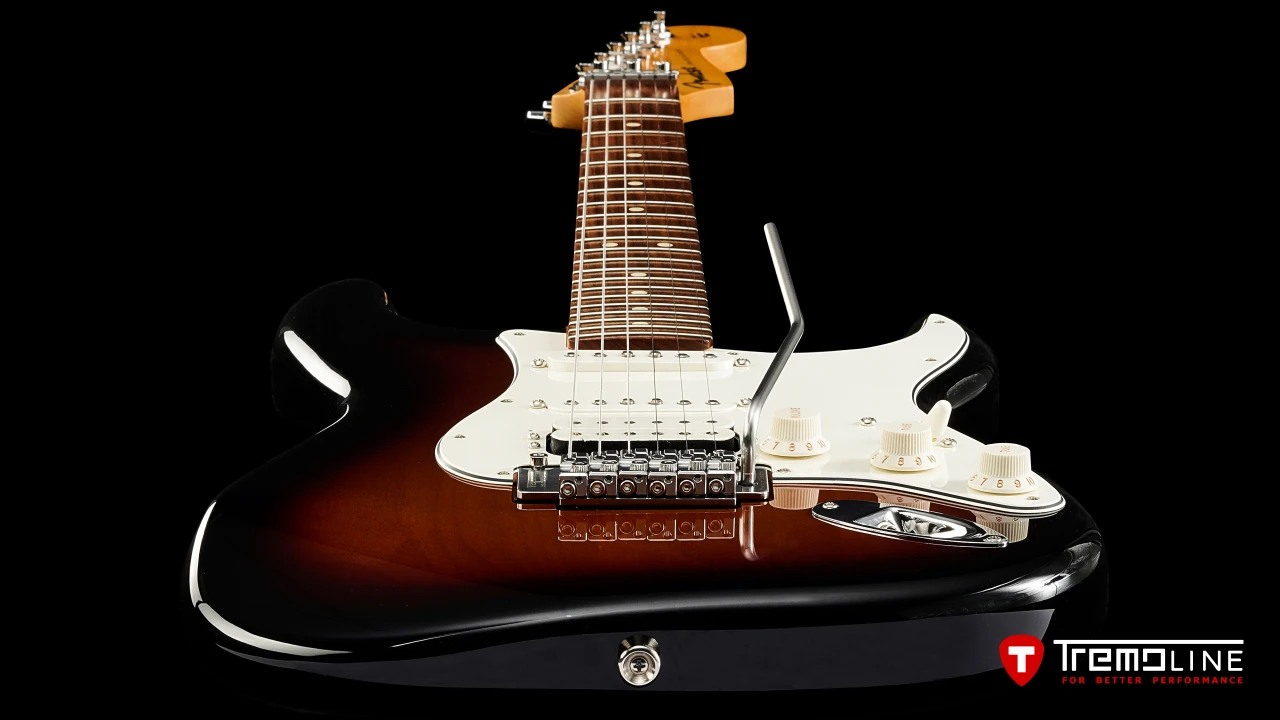 <img src=”Tremoline-guitar-double-locking-tremolo-Fender-Stratocaster-RH-1280x720-J1B.jpg” width="1280" height="720" alt=”Tremoline FT36M double locking tremolo on Fender Stratocaster RH guitar” />