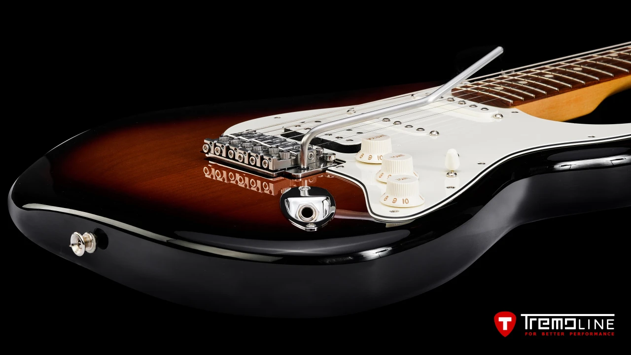 <img src=”Tremoline-guitar-double-locking-tremolo-Fender-Stratocaster-RH-1280x720-J2A.jpg” width="1280" height="720" alt=”Tremoline FT36M double locking tremolo on Fender Stratocaster RH guitar” />