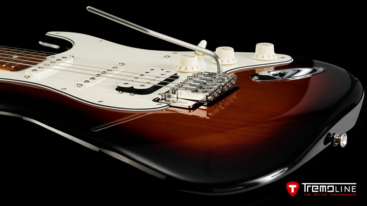 <img src=”Tremoline-guitar-double-locking-tremolo-Fender-Stratocaster-RH-1280x720-J2C.jpg” width="1280" height="720" alt=”Tremoline FT36M double locking tremolo on Fender Stratocaster RH guitar” />