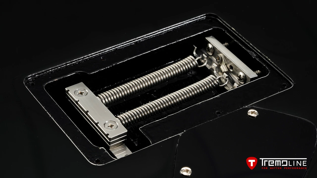 <img src=”Tremoline-guitar-double-locking-tremolo-Harley-Benton-Fusion-LH-1280x720-I2B.jpg” width="1280" height="720" alt=”Tremoline FT36M on Harley Benton Fusion III LH spring cavity” />