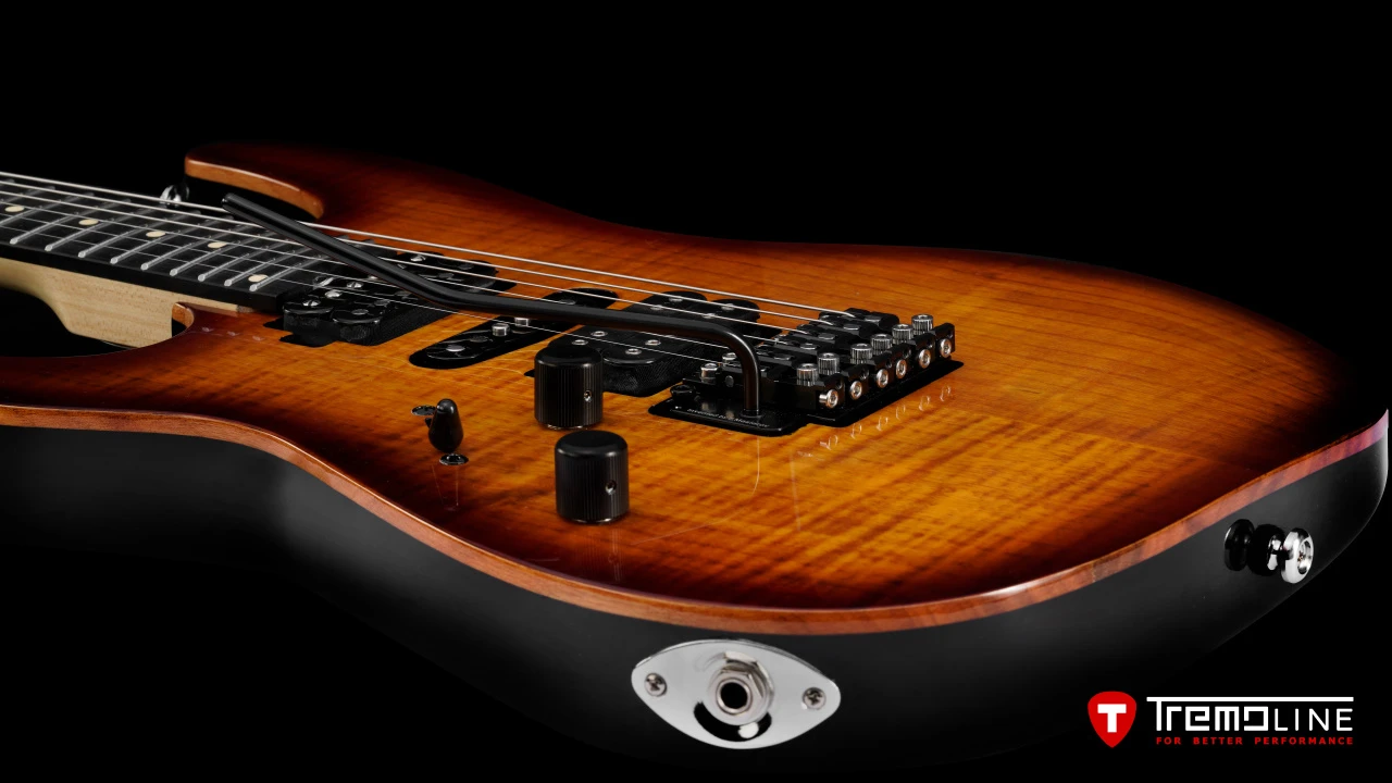 <img src=”Tremoline-guitar-double-locking-tremolo-Harley-Benton-Fusion-LH-1280x720-I2C.jpg” width="1280" height="720" alt=”Tremoline FT36M double locking tremolo on Harley Benton Fusion III LH guitar” />