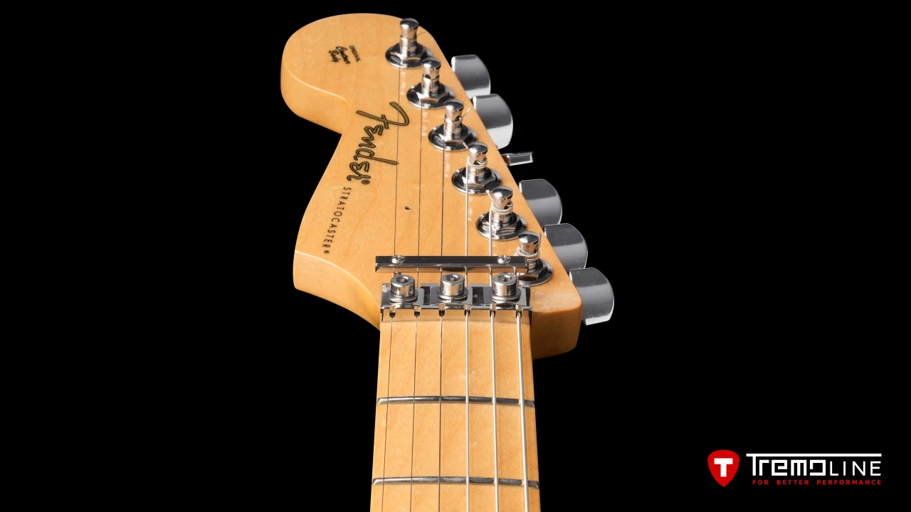 <img src=”Tremoline-guitar-tremolo-Fender-Stratocaster-LH-1280x720-05.jpg” width="1280" height="720" alt=”Tremoline LN6A locking nut on Fender Stratocaster LH guitar” />