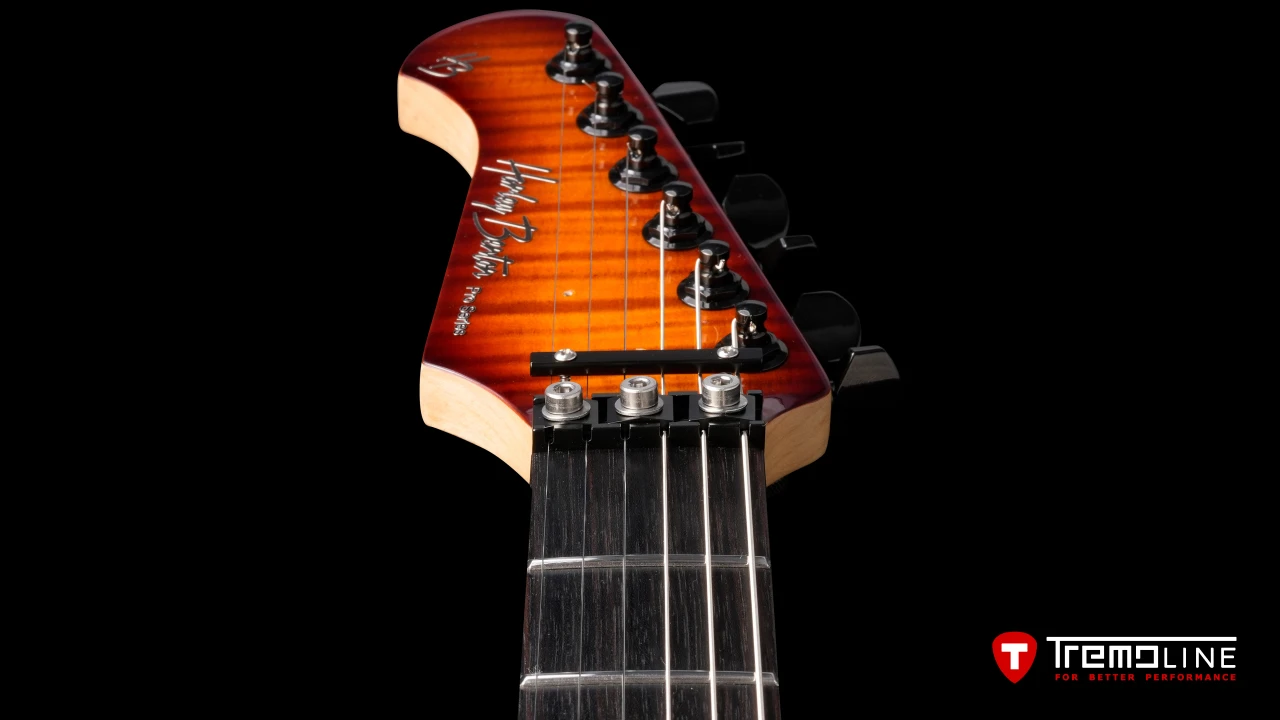 Tremoline-guitar-tremolo-Harley-Benton-Fusion-LH-1280x720-07.jpg <img src=”Tremoline-guitar-tremolo-Harley-Benton-Fusion-LH-1280x720-07.jpg” width="1280" height="720" alt=”Tremoline LN6A locking nut on Harley Benton Fusion III LH guitar” />