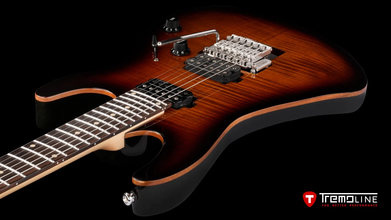 <img src=”Tremoline-guitar-tremolo-Harley-Benton-Fusion-RH-1280x720-04.jpg” width="1280" height="720" alt=”Tremoline FT36T tremolo on Harley Benton Fusion III RH guitar” />