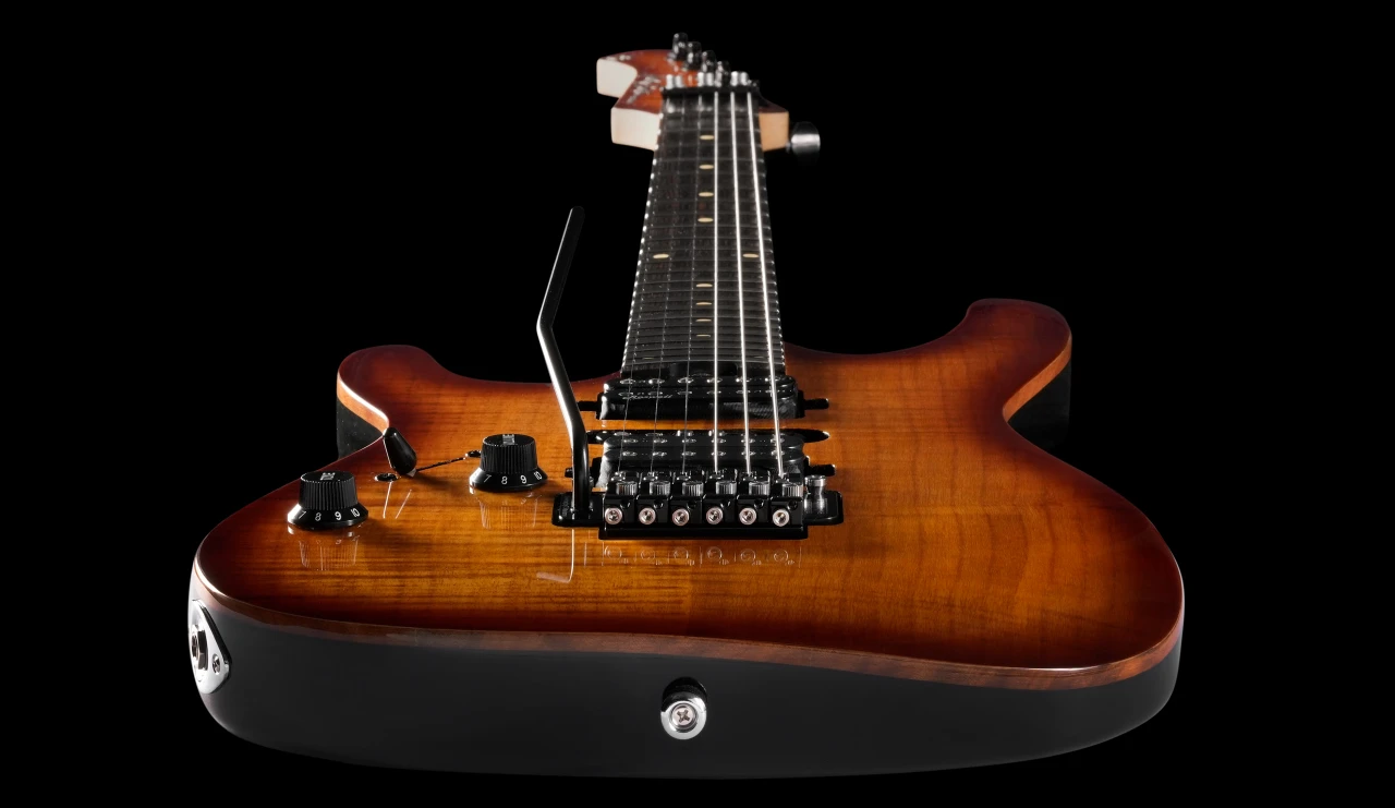 Tremoline-FT36T-guitar-locking-tremolo-1280x741-v06 <img src=”Tremoline-FT36T-guitar-locking-tremolo-1280x741-v06.jpg” alt=”guitar with black tremolo over the black background”>