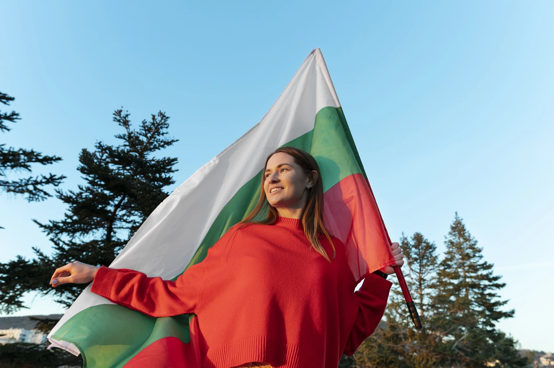 93-woman-holding-bulgarian-flag-outdoors-17085152027767.jpg