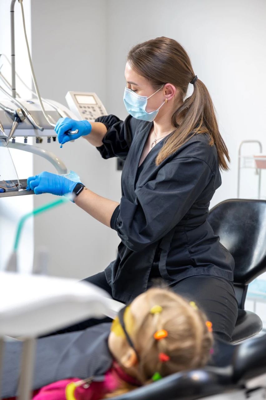 894-3young-female-dentist-work-dentistry-treatment-childrens-teeth-large-17871476992231.jpeg