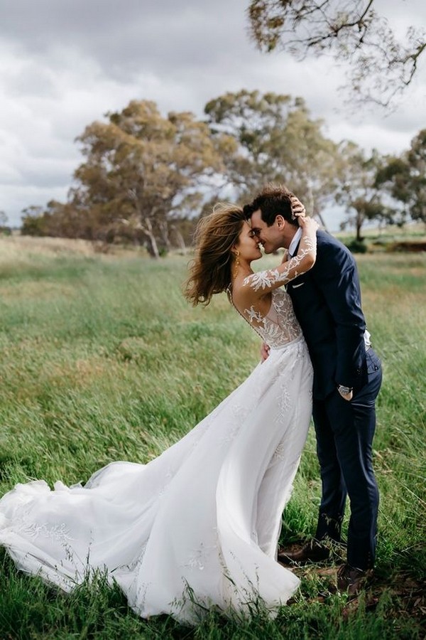 169-romantic-windswept-bride-and-groom-wedding-photo-ideas.jpg
