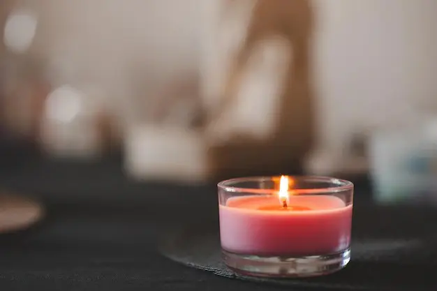 581-burning-scented-candle-glass-jar-staying-table-room-bedroom-closeup-aromatherapy-16723153698113.jpg